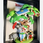 Scène Astérix et Obélix en figurines Playmobil sous un arbre avec sangliers, chien blanc et légionnaire romain