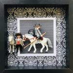 Tableau figurines Playmobil représentant Don Quichotte sur son cheval et Sancho Panza