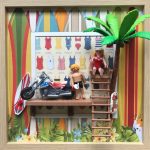 Tableau en figurines représentant Los Angeles, paysage urbain stylisé et détourné dans une mise en scène ludique.